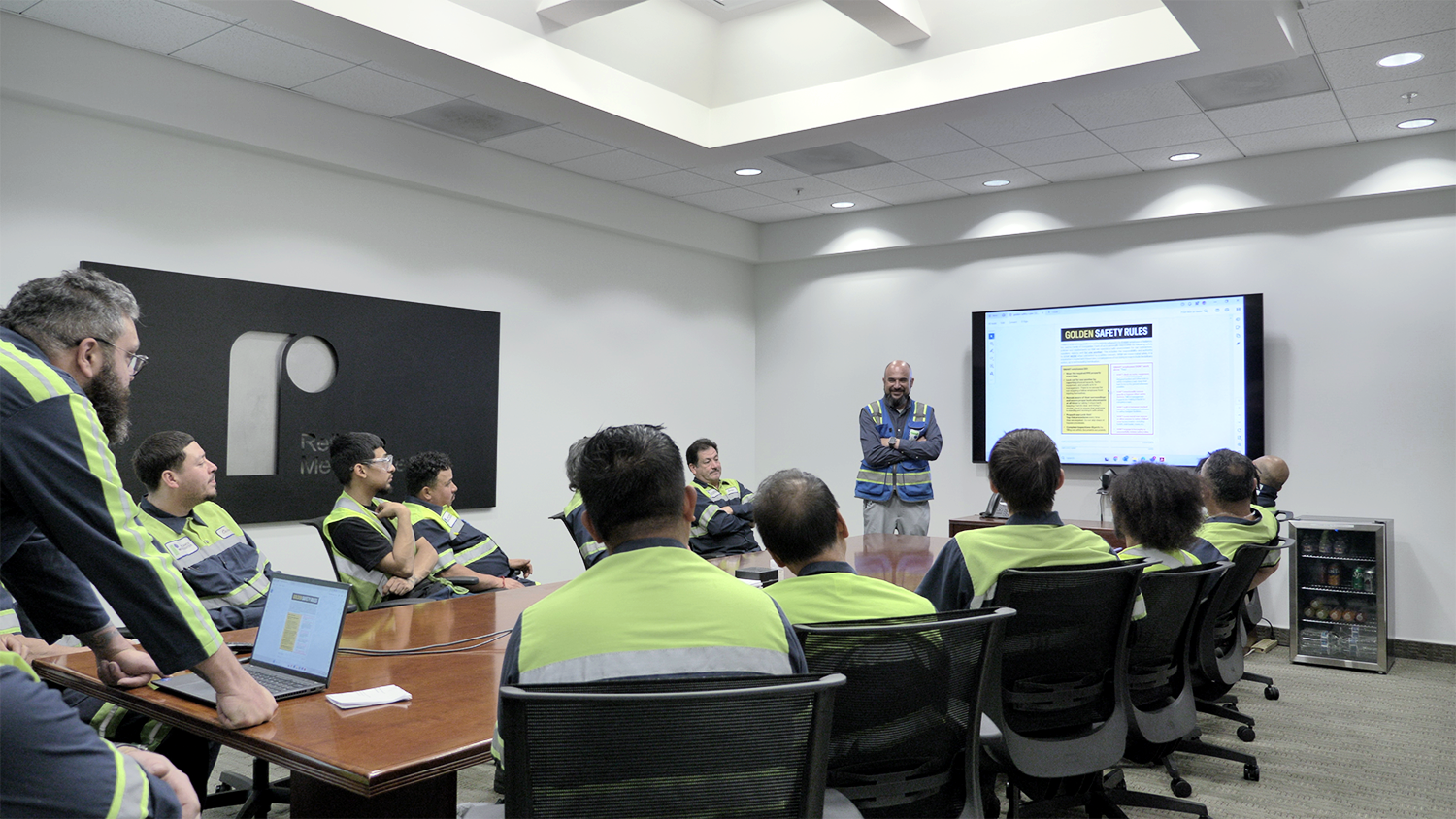 An in-office safety meeting of steel and aluminum supplier Reliance Metalcenter is shown